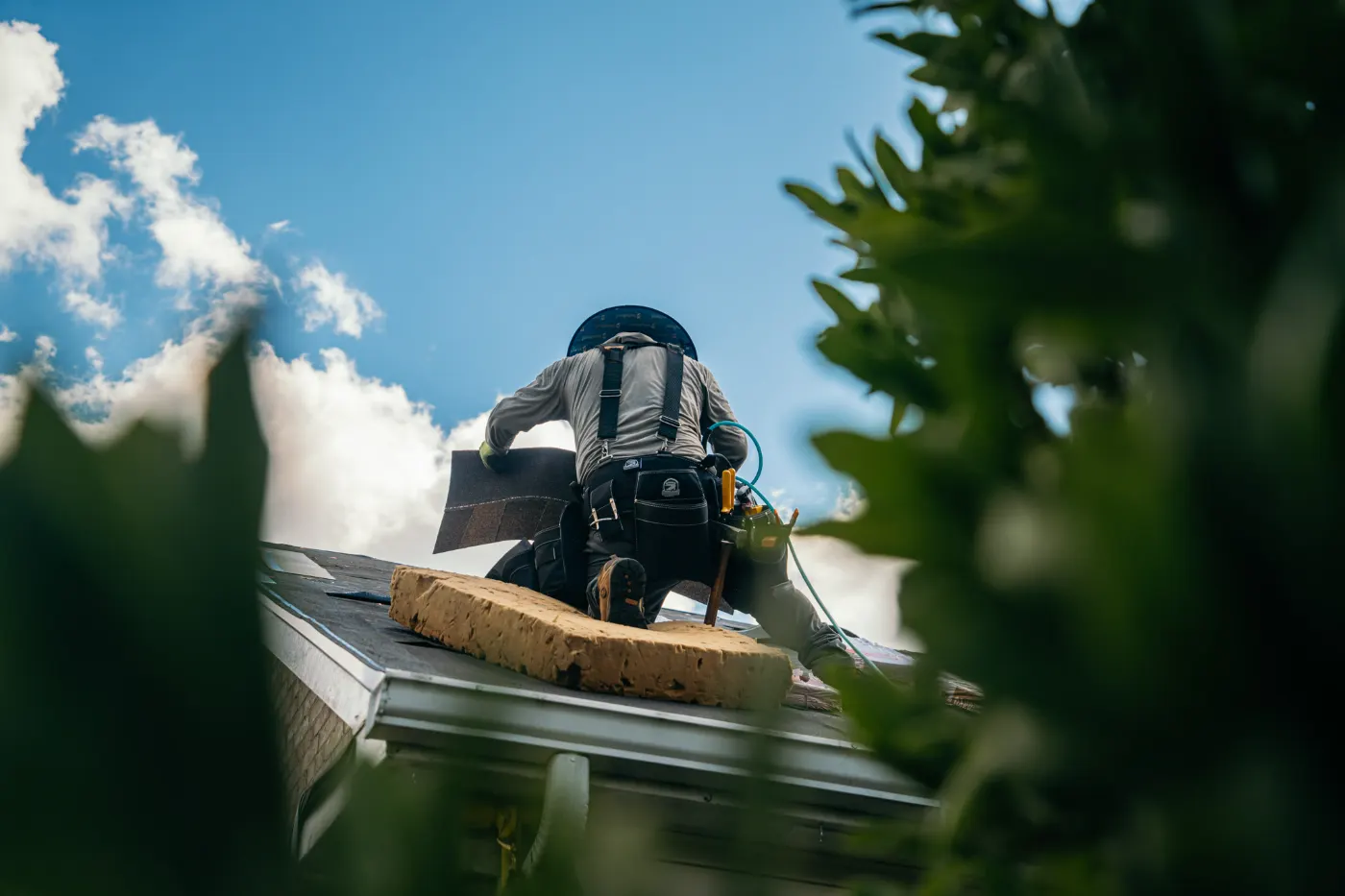 Emergency tarping on a Ingalls roof