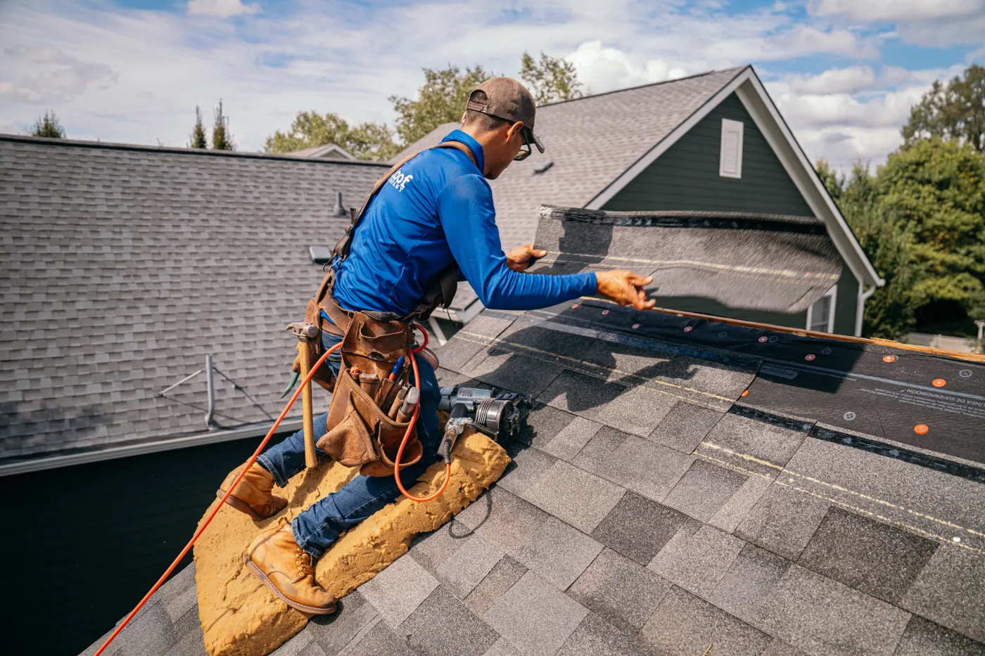 Emergency tarping on a Ingalls roof